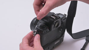 adjusting camera strap