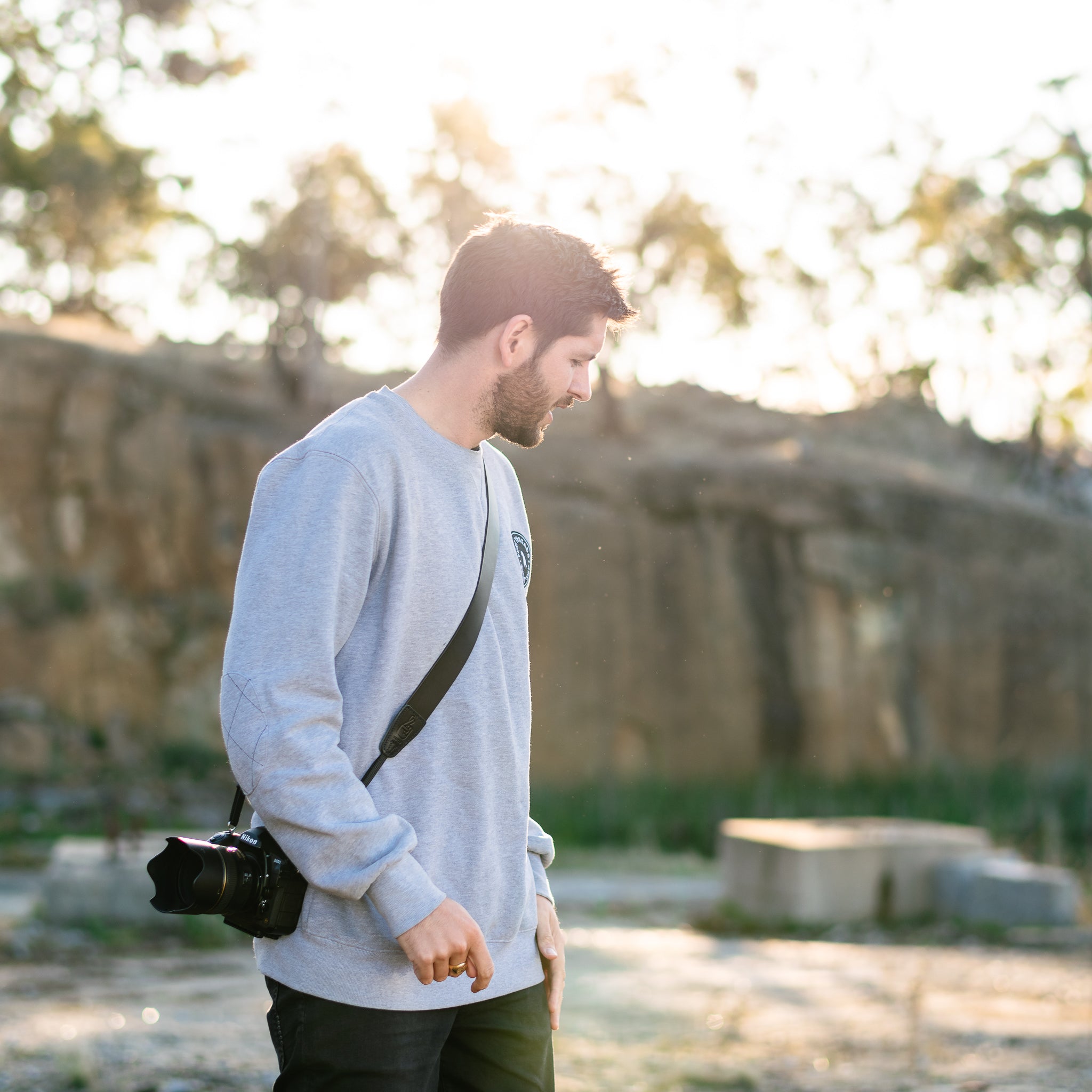 Crossbody bag outlet with camera strap